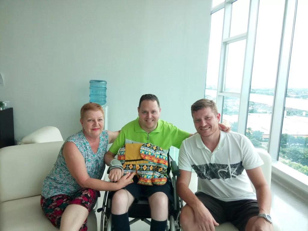 Gabi Iordache with Henning Kalwa and a companion during his healthcare journey